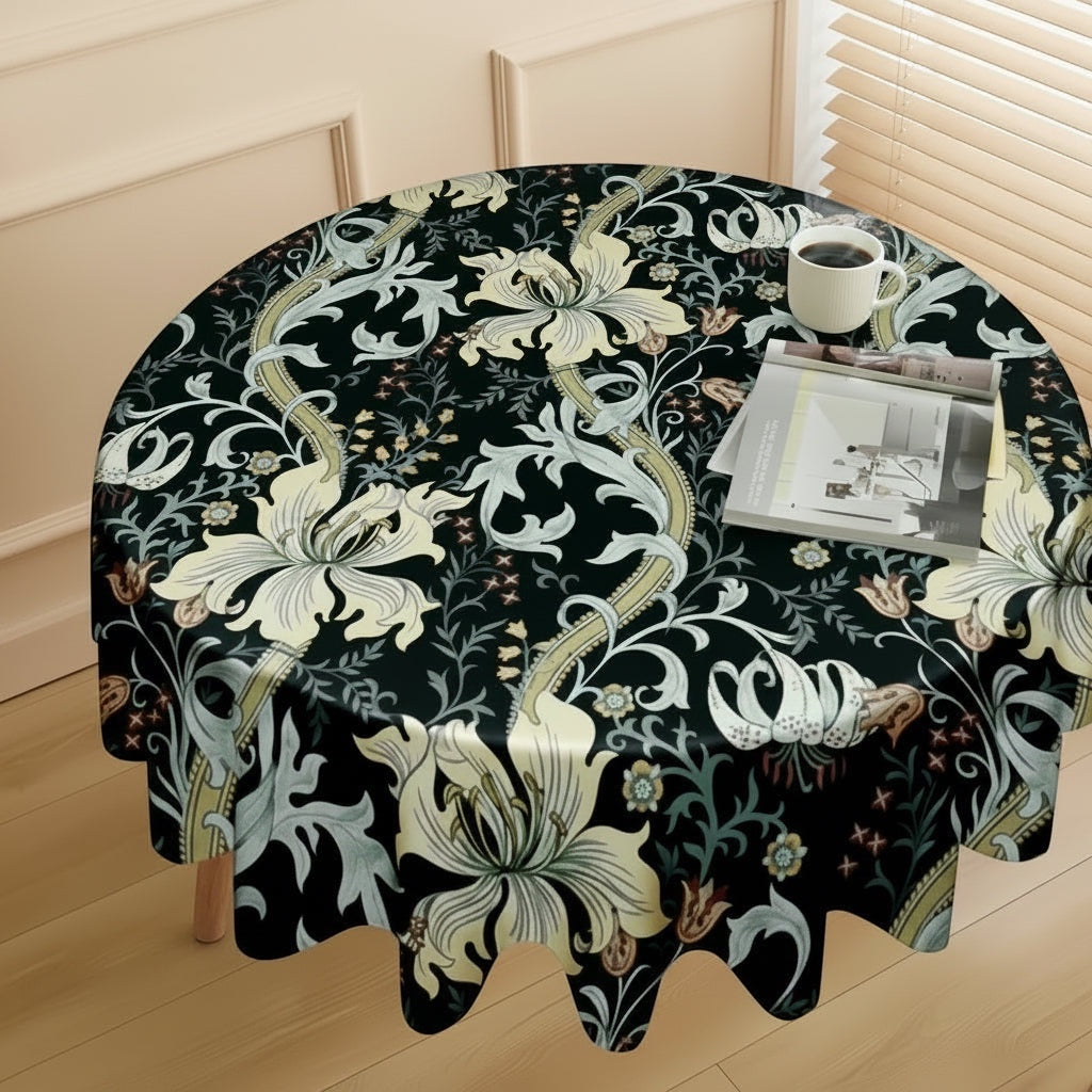 Eclectic round tablecloth with vintage floral pattern in black, cream, green, and gold on drip-dry fabric.