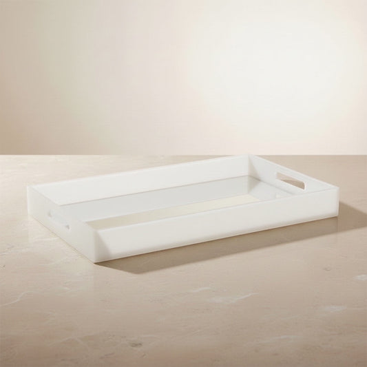 Eclectic white acrylic serving tray with a mirrored base and integrated handles on a neutral surface.
