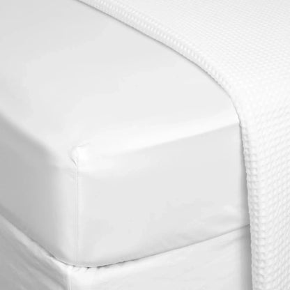 Eclectic white 300TC Egyptian cotton sateen fitted sheet with a smooth, silky finish on a deep mattress.