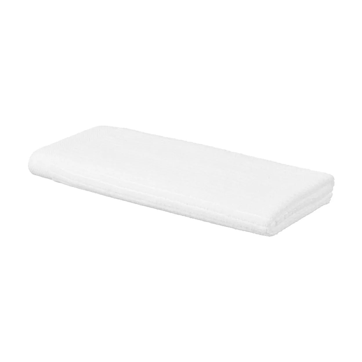 Eclectic white velvet cotton guest towel with a soft, plush texture for bathroom use.