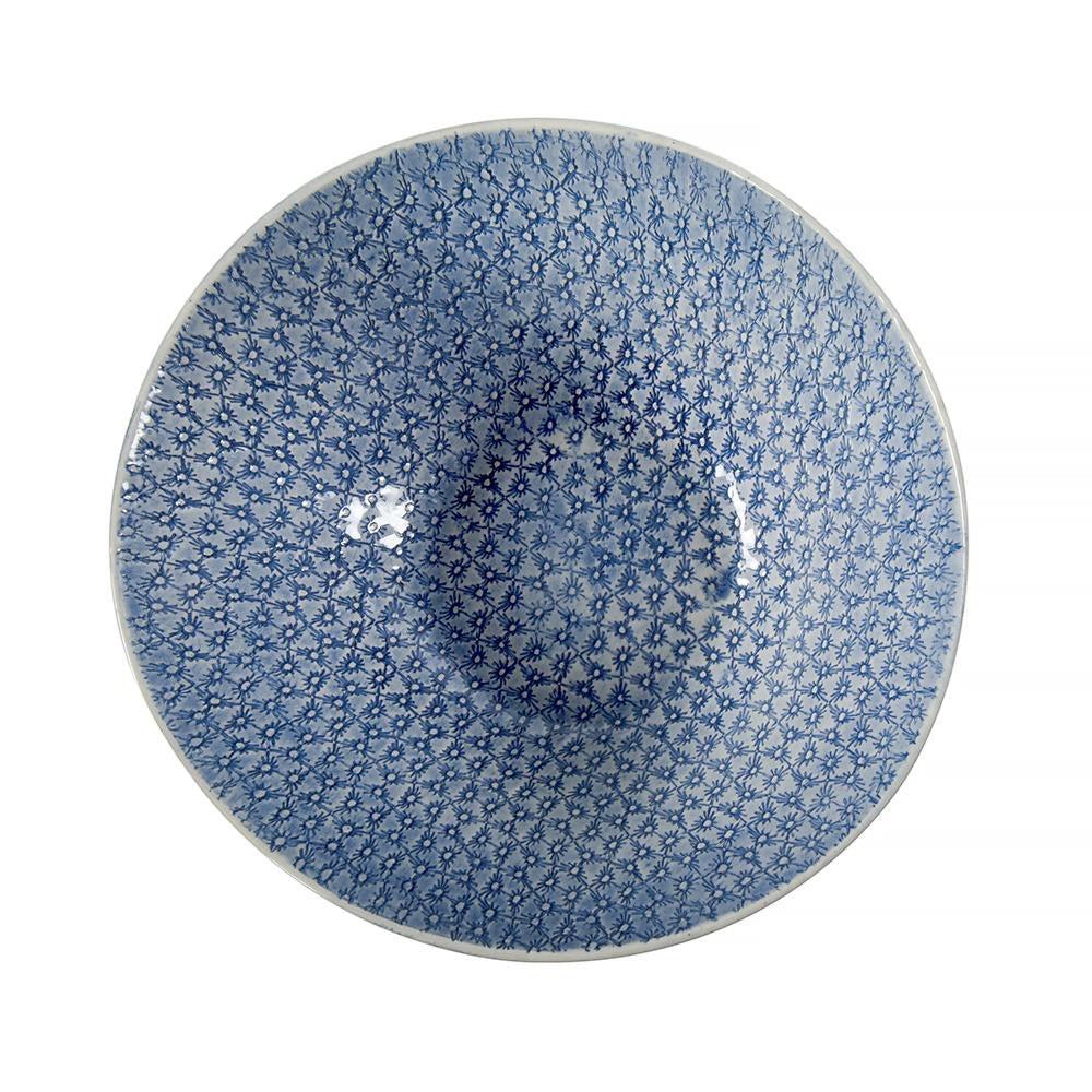 Eclectic Wonki Ware handcrafted pottery salad bowl with a blue and white floral pattern, top-down view.