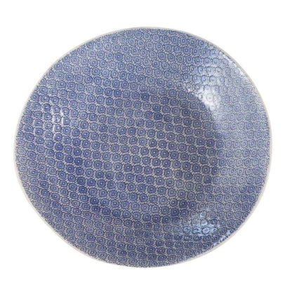 Eclectic Wonki Ware extra large round stoneware serving bowl with a blue and white intricate hand-stamped pattern.
