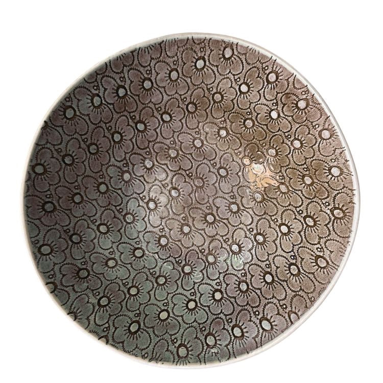 Eclectic Wonki Ware large handmade pottery spaghetti bowl with a grey and white floral pattern, top-down view.