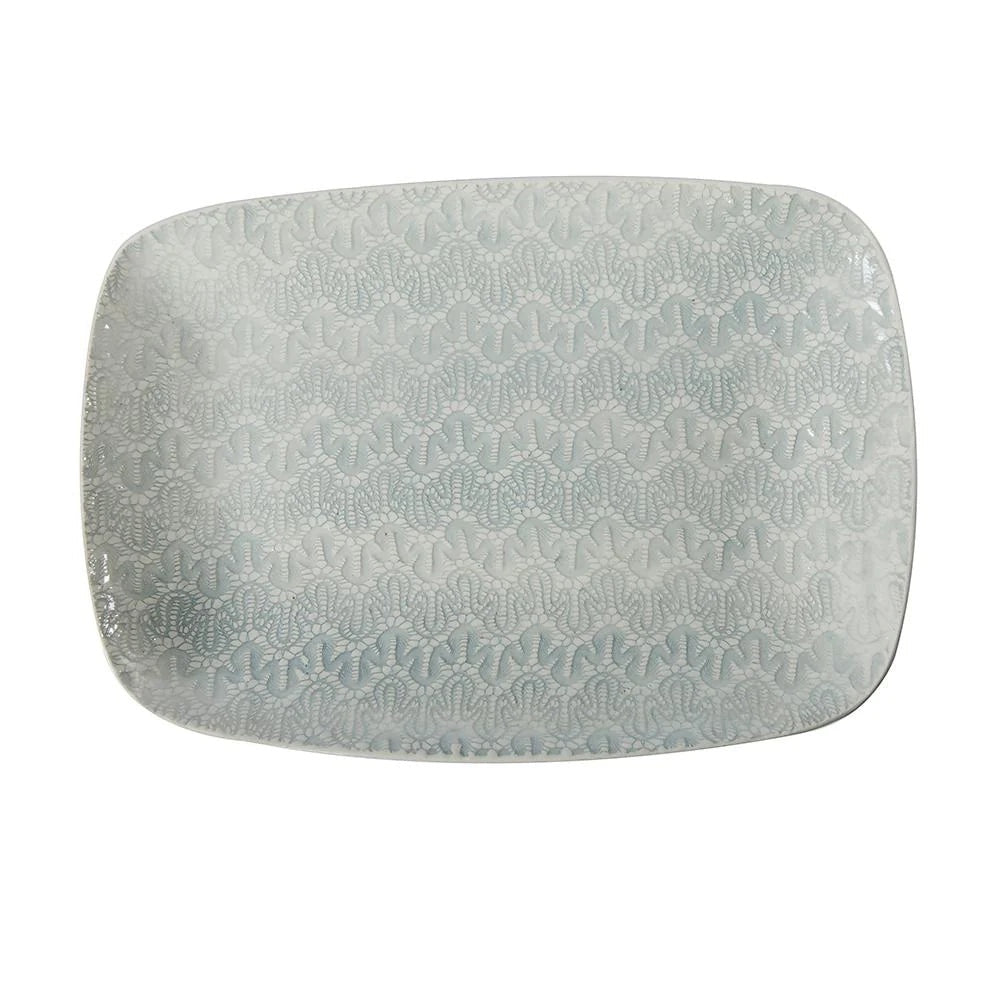 Eclectic Wonki Ware rectangular stoneware roasting platter with a unique hand-impressed lace pattern in soft blue