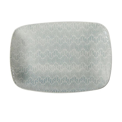 Eclectic Wonki Ware rectangular stoneware roasting platter with a unique hand-impressed lace pattern in soft blue