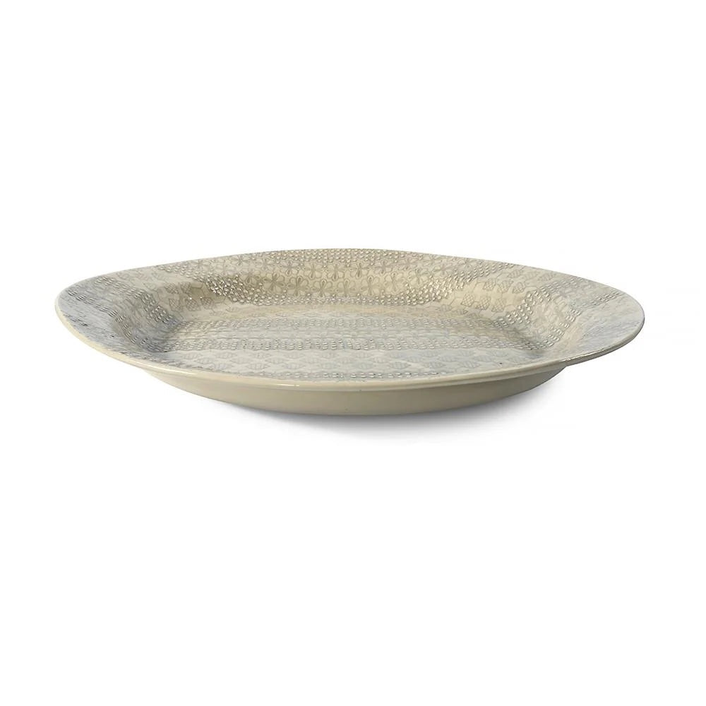 Eclectic Wonki Ware large handcrafted Mediterranean pottery platter with a shallow shape and textured floral pattern.