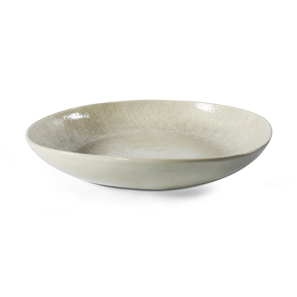 Eclectic Wonki Ware large handcrafted pottery pie dish in a neutral tone with a subtle geometric pattern.