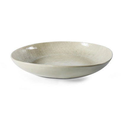 Eclectic Wonki Ware large handcrafted pottery pie dish in a neutral tone with a subtle geometric pattern.