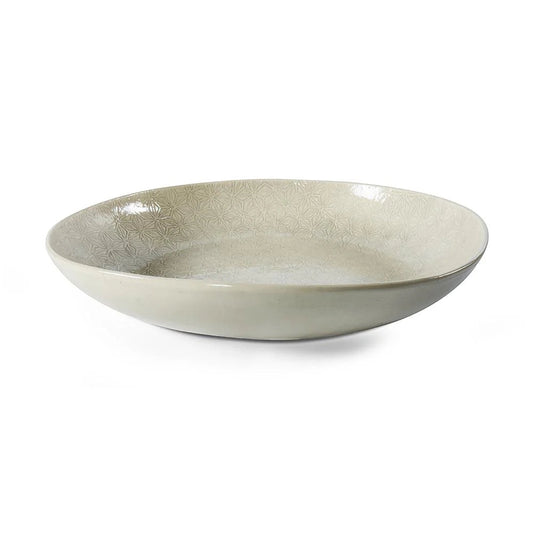 Eclectic Wonki Ware large handcrafted pottery pie dish in a neutral tone with a subtle geometric pattern.