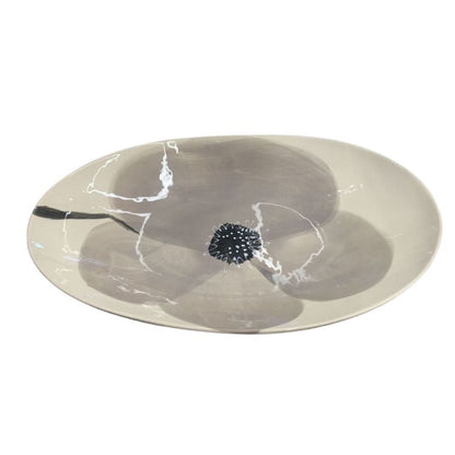 Eclectic Wonki Ware oval stoneware bowl in warm grey with a hand-painted poppy motif and organic glaze finish.