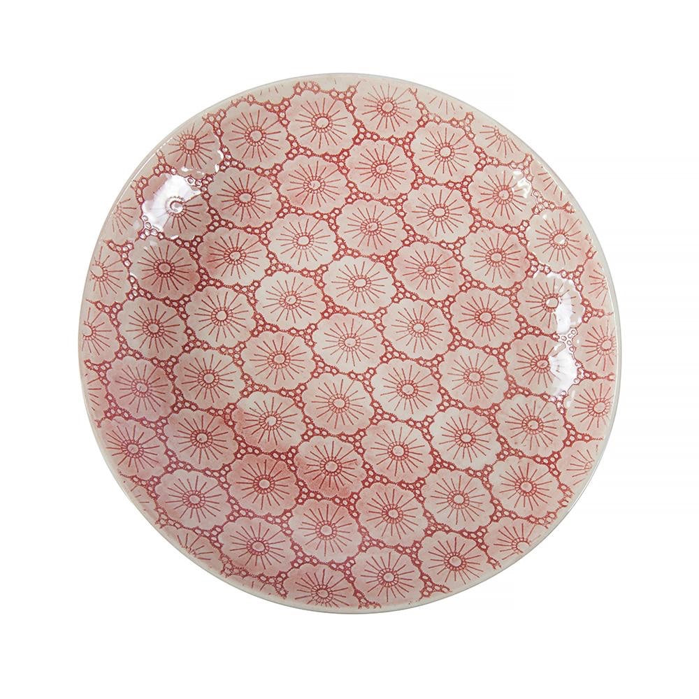 Eclectic Wonki Ware large handmade pottery spaghetti bowl with a pink floral pattern, top-down view.