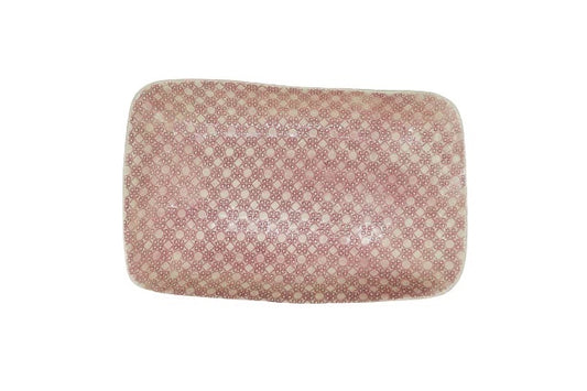 Eclectic Wonki Ware rectangular roasting platter in pink with a delicate hand-impressed lace pattern.
