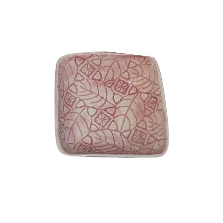 Eclectic Wonki Ware handcrafted square ceramic ramekin in dusty pink with a delicate embossed leaf and geometric pattern.
