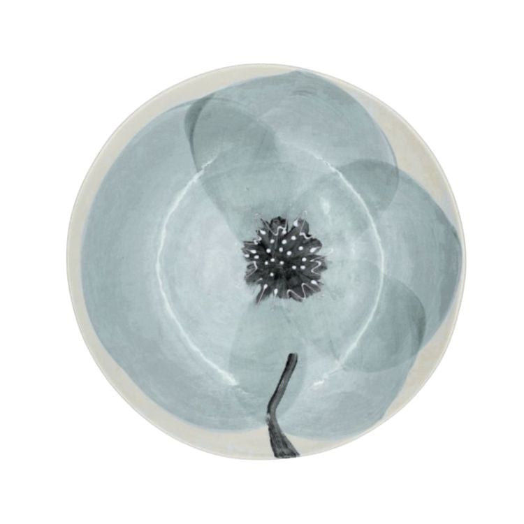 Eclectic Wonki Ware Poppy Collection large handmade pottery spaghetti bowl with a hand-painted blue floral motif.