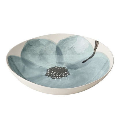 Eclectic Wonki Ware Poppy Collection large handmade pottery spaghetti bowl with a blue hand-painted floral motif.