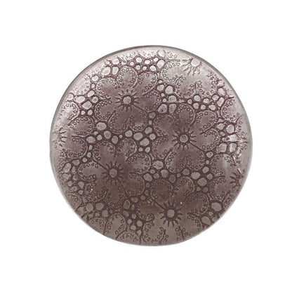 Eclectic Wonki Ware handcrafted stoneware salsa dish with a unique mauve lace-like floral pattern on a white background.