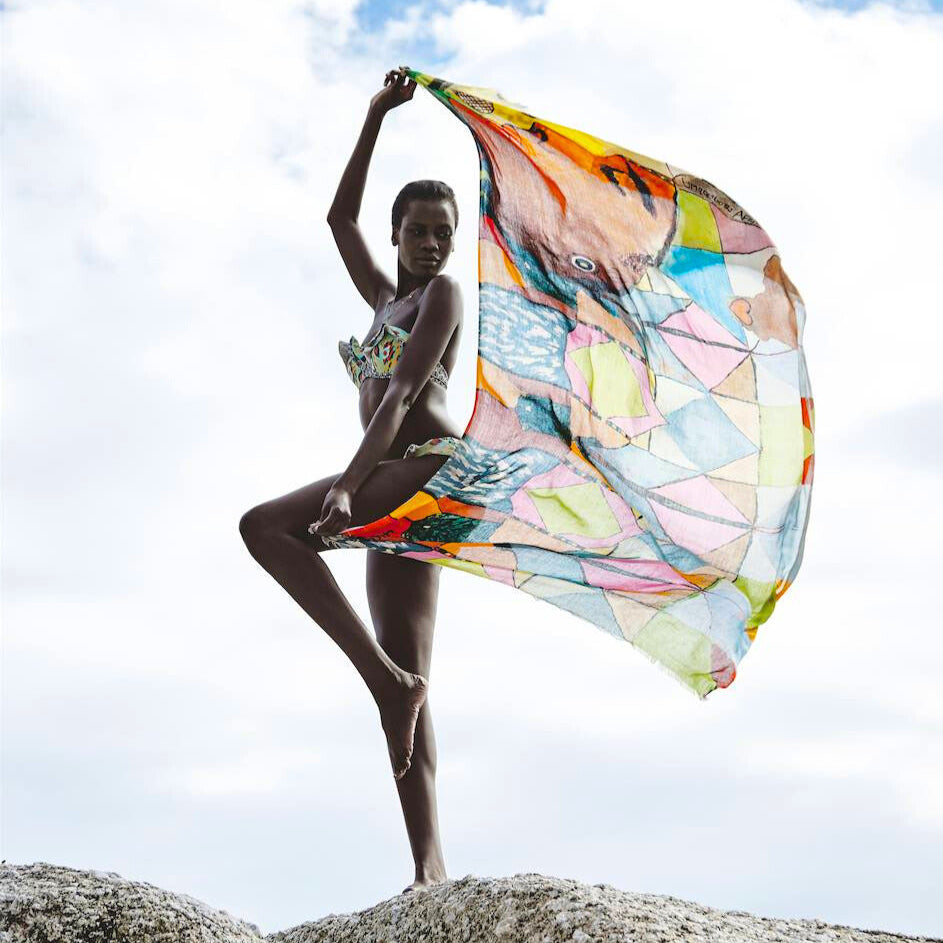 Lalela Scarf collection featuring a colourful scarf in an outdoor setting.