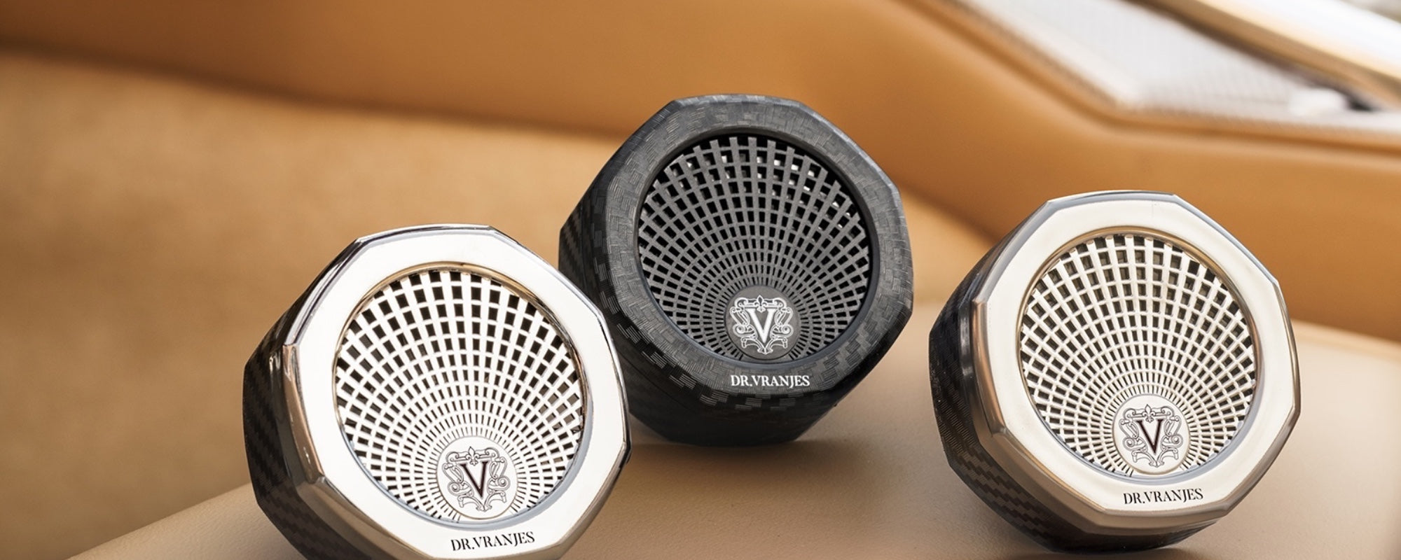 Dr Vranjes car fragrance diffusers displayed inside a car interior.